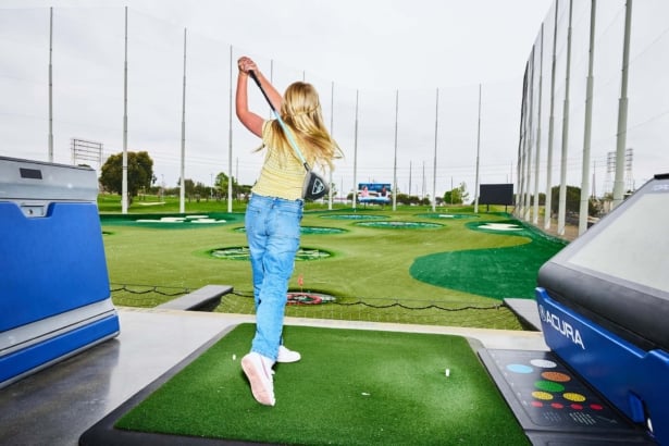 Topgolf Girl Swinging