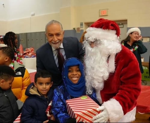 Kids get over 1,300 toys at Westbury community center Troiano Toy Drive Santa