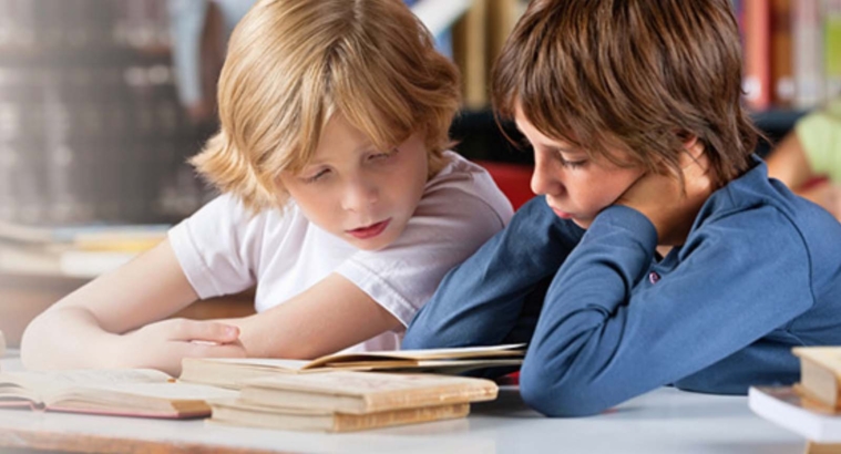 LI realty firm launches book drive with The Book Fairies Book Kids