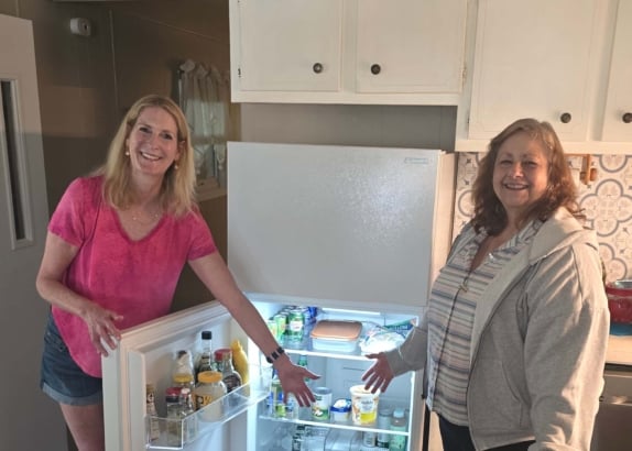 Cona Elder Law helps Riverhead senior beat the heat with new fridge Cona Fridge Donation
